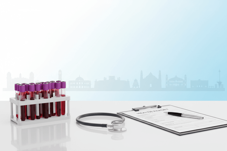 most ordered blood tests Pune with test tubes, stethoscope and health report